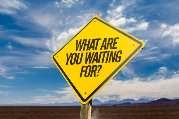 What Are You Waiting For? What Are You Waiting For? road sign dillydally stock pictures, royalty-free photos & images