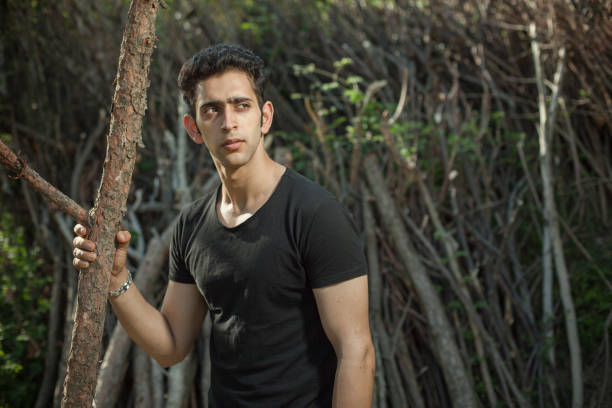 istock Young and attractive man in woods. 826442024