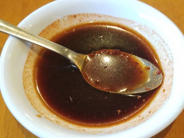 istock a spoon in some spicy sauce 826443130