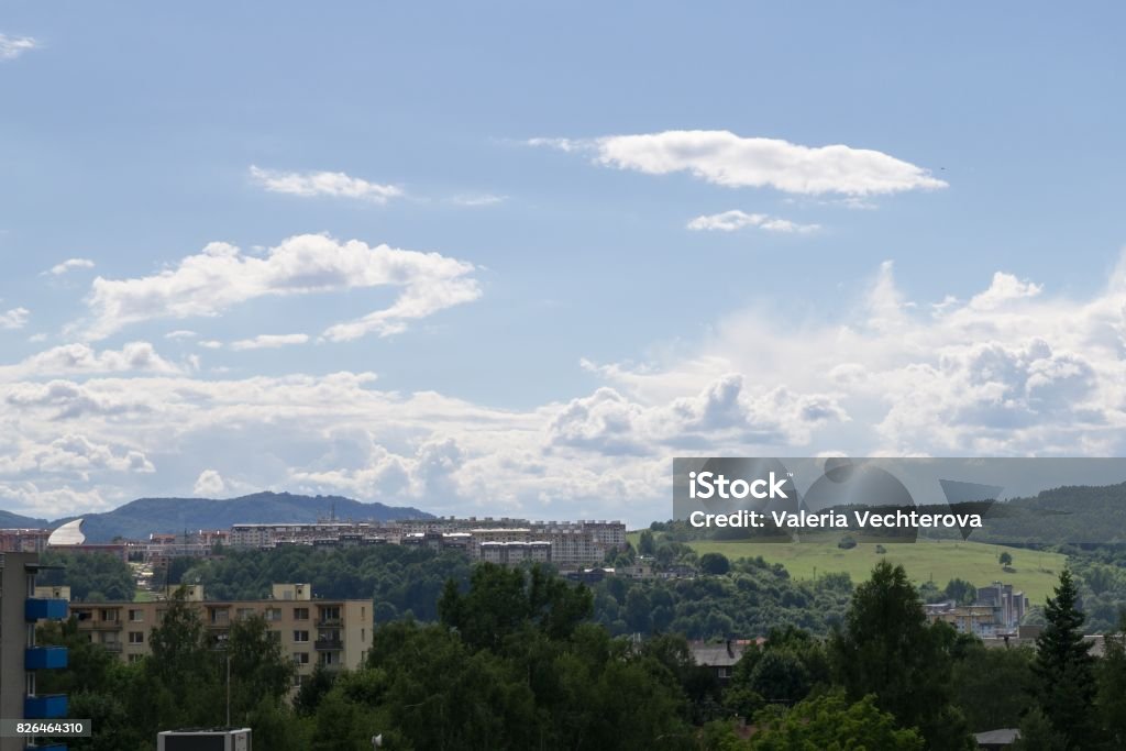 Clouds over the town. Clouds over the town. Slovakia Agricultural Field Stock Photo Clouds over the town. Clouds over the town. Slovakia Agricultural Field Stock Photo