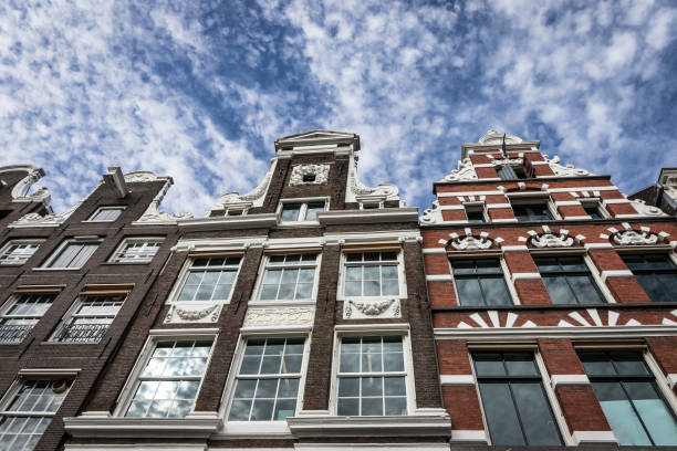 Streetscape of buildings in a neighbourhood called Jordaan in central Amsterdam, Netherlands.   Jordaan, previously a working class neighbourhood, has undergone gentrification.