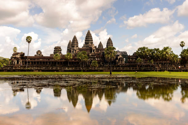 istock Angkor Wat (Temple City) and its reflection in the lake, a Buddhist, temple complex in Cambodia and the largest religious monument in the world. View from the garden 826468962
