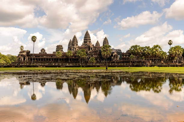 istock Angkor Wat (Temple City) and its reflection in the lake, a Buddhist, temple complex in Cambodia and the largest religious monument in the world. View from the garden 826468978