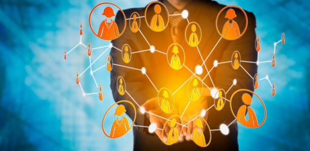 istock Man Offers Virtual Community Of Interlinked Peers 826469102