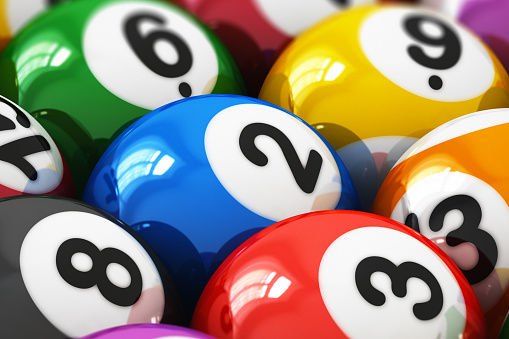 3D render illustration of the macro view of color balls with numbers for american billiard game with selective focus effect