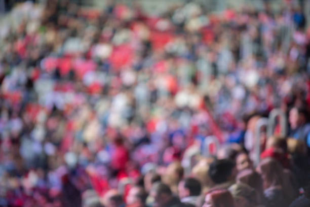 istock Blurred crowd of spectators on a stadium tribune 826471386
