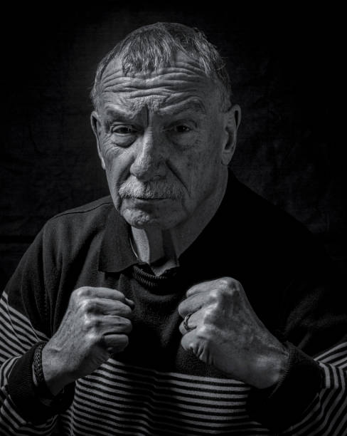 istock senior man with his fists raised 826471982