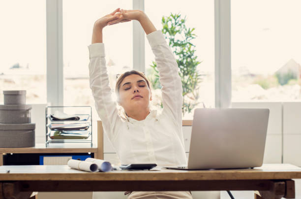 istock Businesswoman stretching her body 826475616