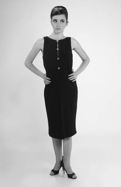istock beautiful young woman in retro style 826478598
