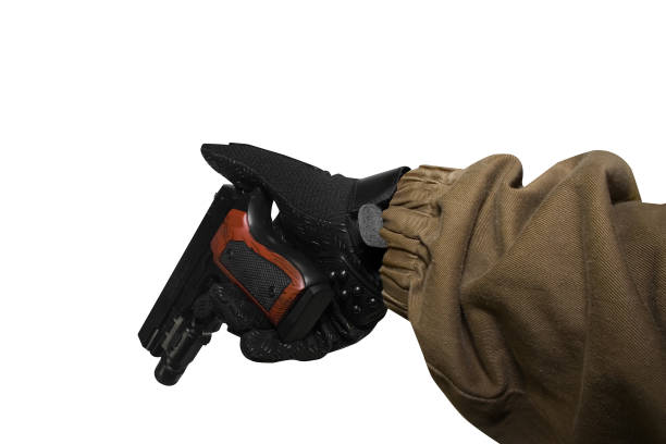 istock Isolated soldier arm holding a reloaded gun. 826482310