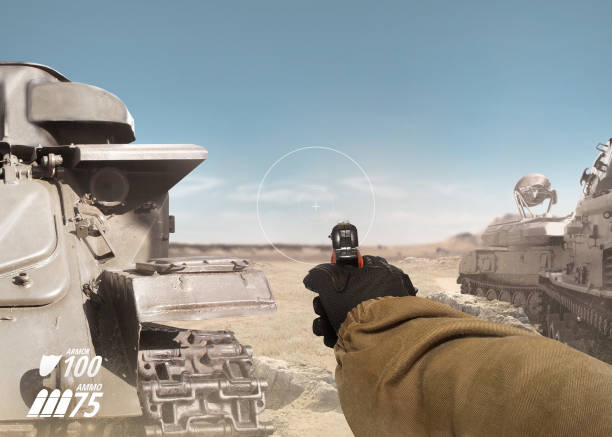First person view soldier hand in black battle gloves & tactical jacket holding a ready to use gun on desert tank war scene with health & armor indicator.