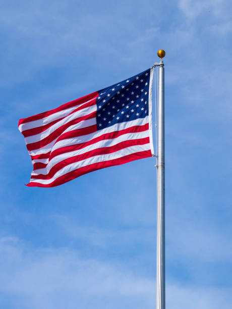 istock The American Flag waving in the wind 826491268