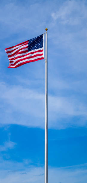 istock The American Flag waving in the wind 826493054