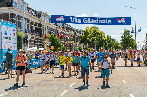 Contestants entering the Via Gladiola, the traditional last street before the finish in the center of Nijmegen