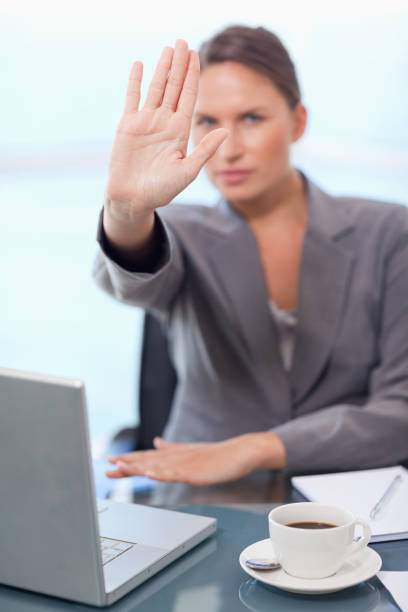 istock Portrait of a young businesswoman refusing a conversation 826497384
