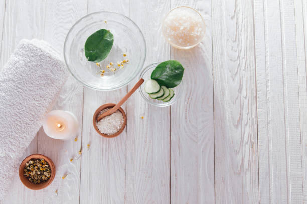 istock Spa essentials including candle, salt, herbs and white clay 826498020