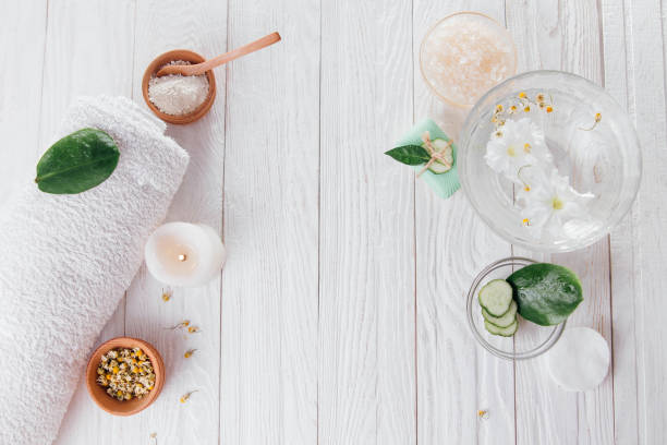istock Spa essentials including candle, salt, herbs and white clay 826498074