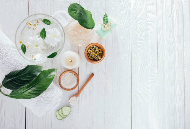 istock Spa essentials including candle, salt, herbs and white clay 826498268