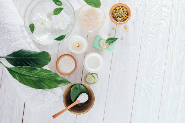 istock Spa essentials including candle, salt, herbs and white clay 826498370
