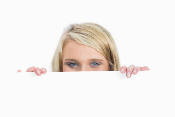 istock Woman hiding behind a notice 826512332