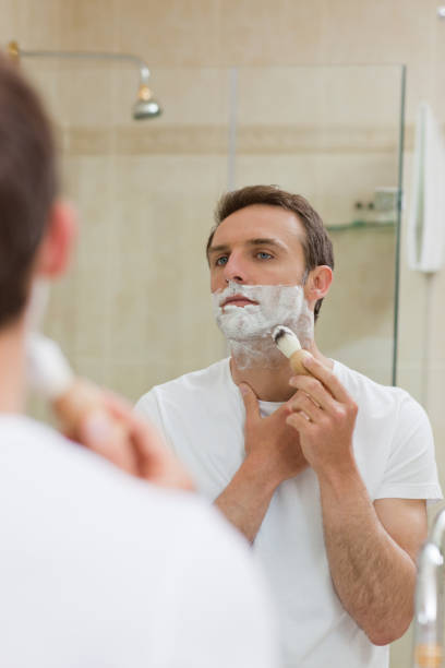 istock Man shaving in the bathroom 826516392
