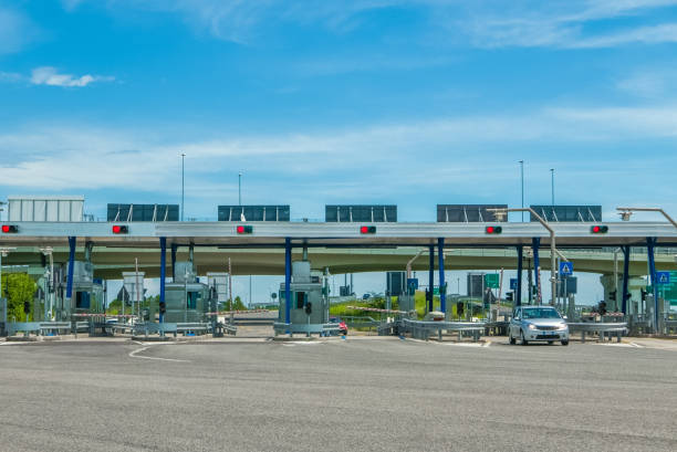istock Cars passing through the toll gate on the motorway 826526992