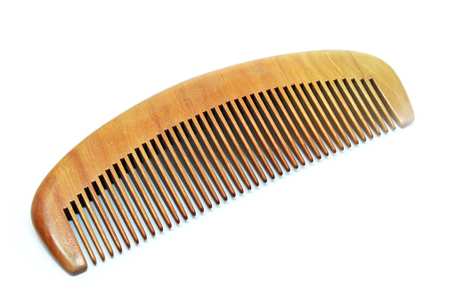 Comb the wood on a isolated white background
