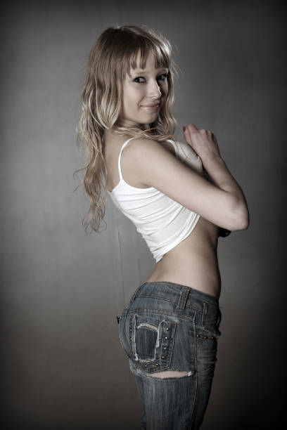 istock Blond girl in jeans 826538192