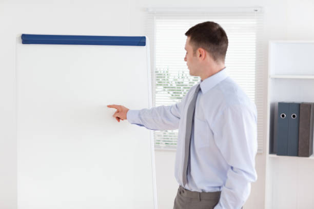 istock Businessman showing the facts 826541656