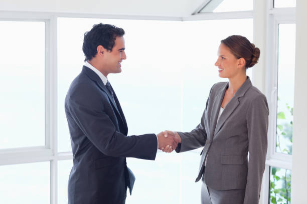 istock Side view of trades partner shaking hands 826544762