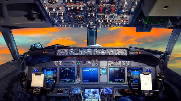 Photo of cockpit Flight Deck sunset