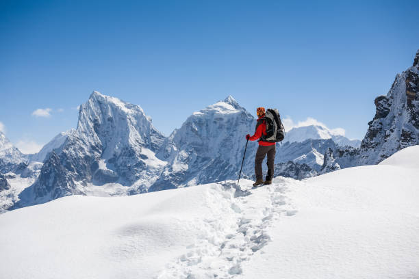 istock Trekker is walking by Renjo La pass in Everest region 826548656