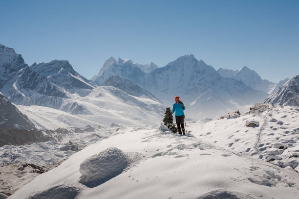 istock Trekker in Khumbu valley on a way to Everest Base camp 826551922