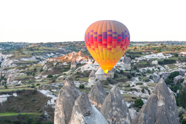 istock Hot Air Balloons in Cappadocia Valleys 826556554