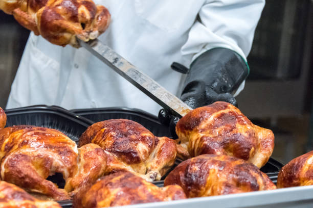 whole roasted chickens for sale in a supermarket