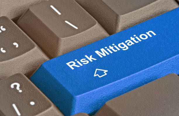 Keyboard with key for risk mitigation stock photo