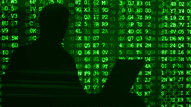 istock Silhouette of a man working for a laptop hacker 3d illustration 826561210