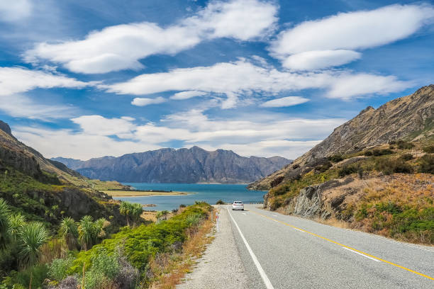 The Landscape of the Lake Hawea, road and mountains from The Neck Lookout. (Wanaka, South Island of New Zealand.) stock photo