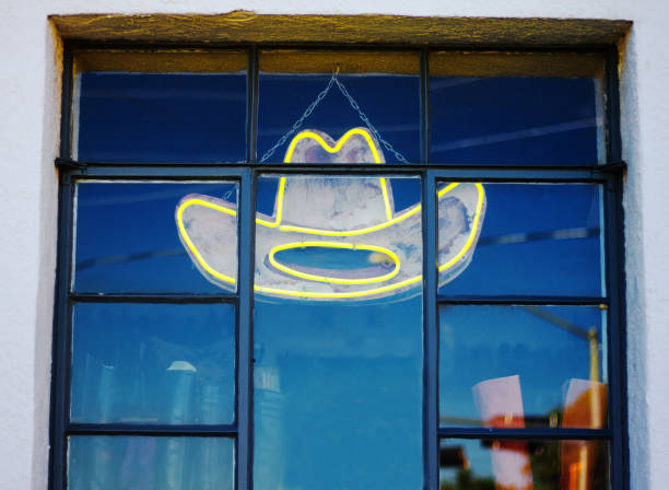 istock Neon Cowboy Hat in Shop Window 826568040