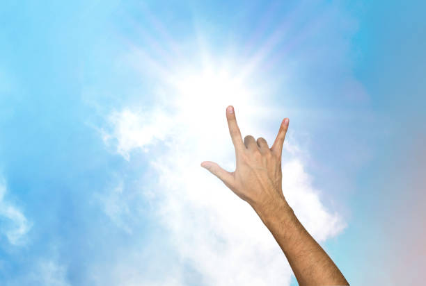 istock Love hand gesture with sky and cloud 826573630