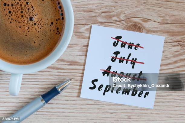 September Beginning And Summer End Concept Written At Notepad With Morning Cup Of Coffee Striked June July August Stock Photo - Download Image Now
