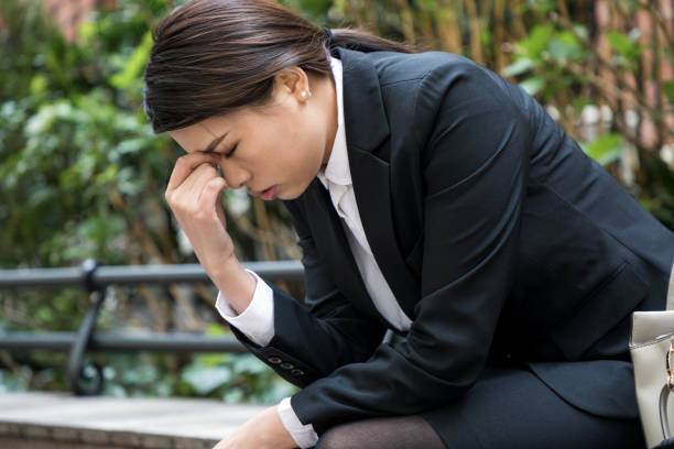 istock depressed business woman 826578240