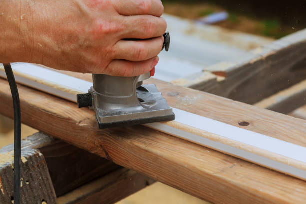 istock Carpenter milled wood upper hand electric router 826581896