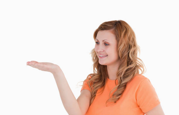 istock Young woman holding her palm up 826585500