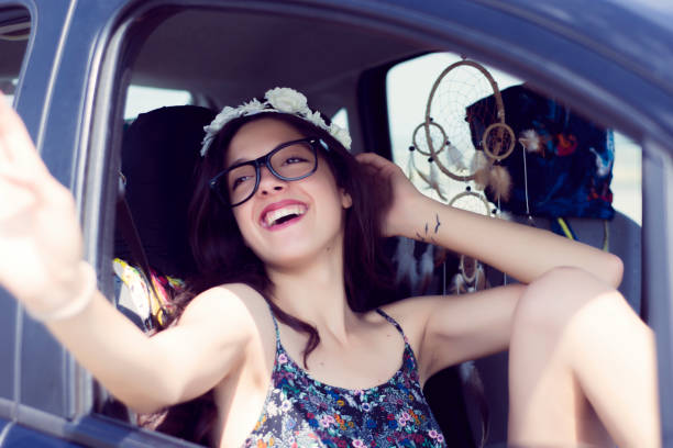 istock Bohemian woman in a car 826588926