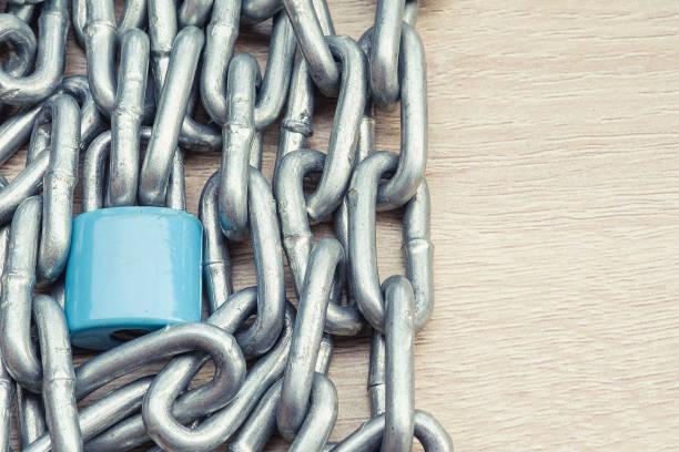 istock check-lock and chain on wooden background concept 826594322