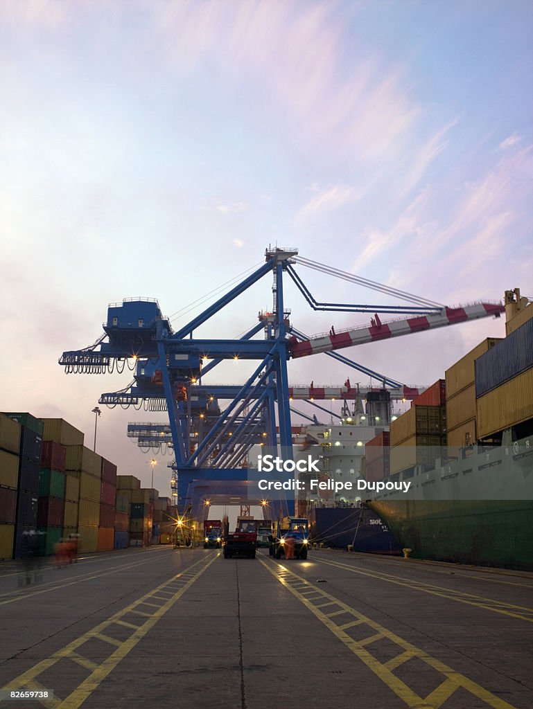Shipping yard at dusk  Crane - Machinery Stock Photo