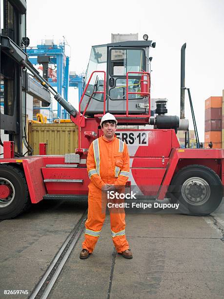 Portrait Of A Man Working In A Shipping Yard Stock Photo - Download Image Now - Cargo Container, Chile, 30-34 Years