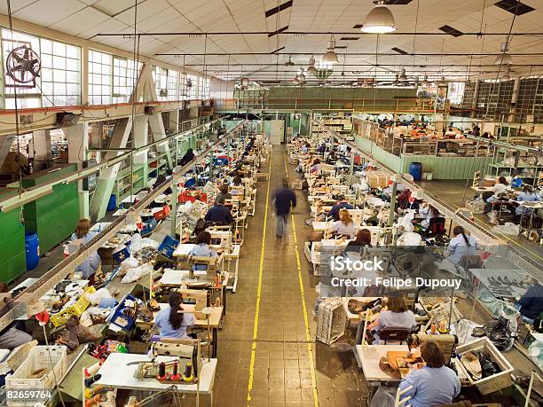 People Working In A Shoe Factory Stock Photo - Download Image Now - Factory, Occupation, Labor Intensive Production Line