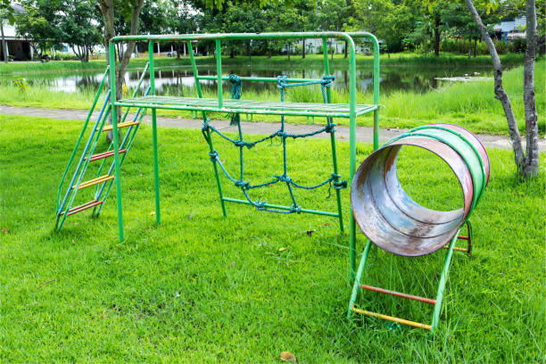 istock Playground equipment for children with green grass background 826598716